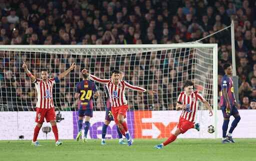 Atletico Madrid moved a step closer to the Champions League semi-finals with an impressive victory over 10-man Barcelona